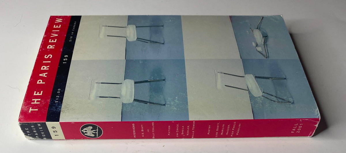 Side view of The Paris Review Magazine Fall 2001 No. 159, showcasing the spine and emphasizing the minimalistic cover design with hues of blue and red.
