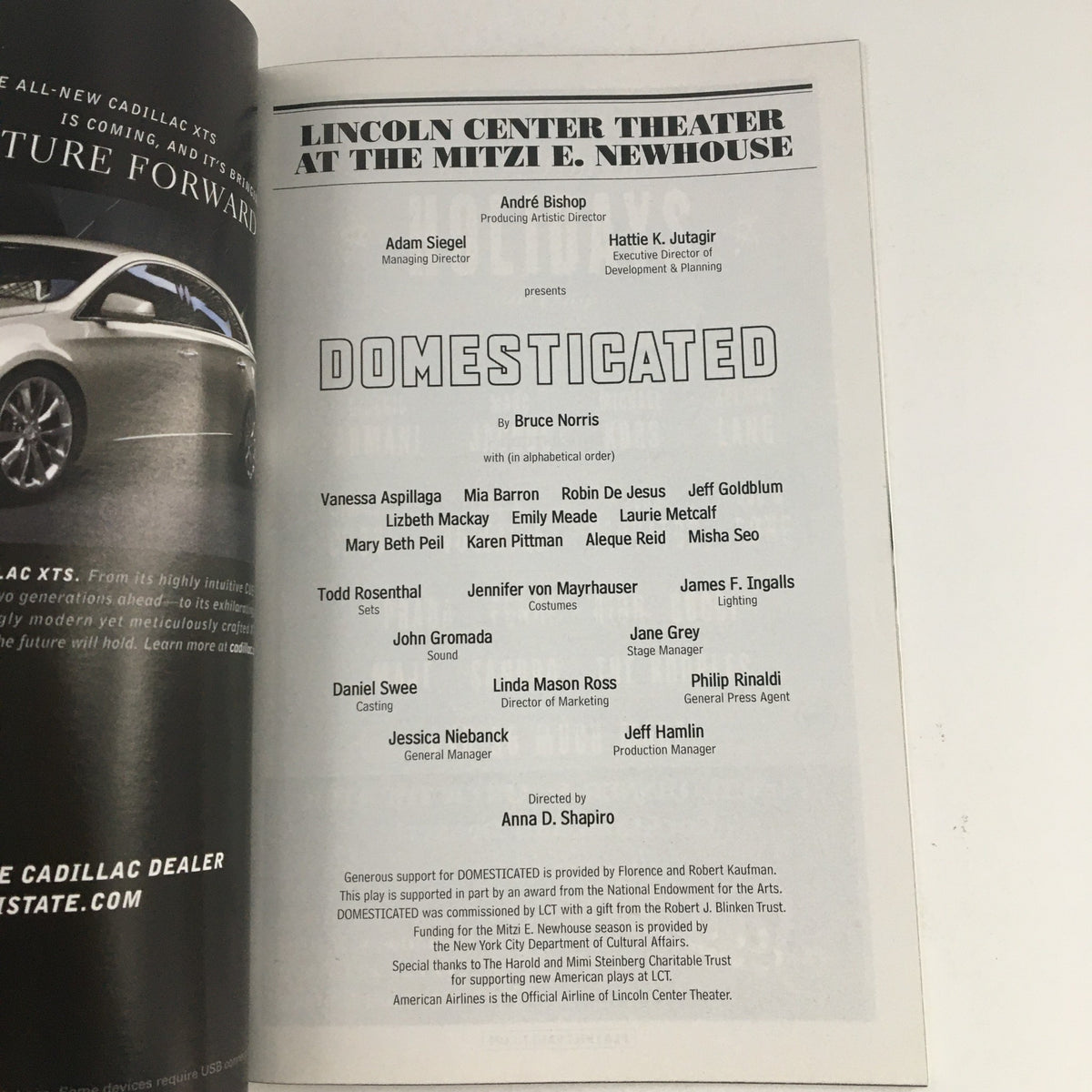 Page from the 2013 Playbill detailing the cast and production team for 'Domesticated' by Bruce Norris, presented by Lincoln Center Theater at the Mitzi E. Newhouse.