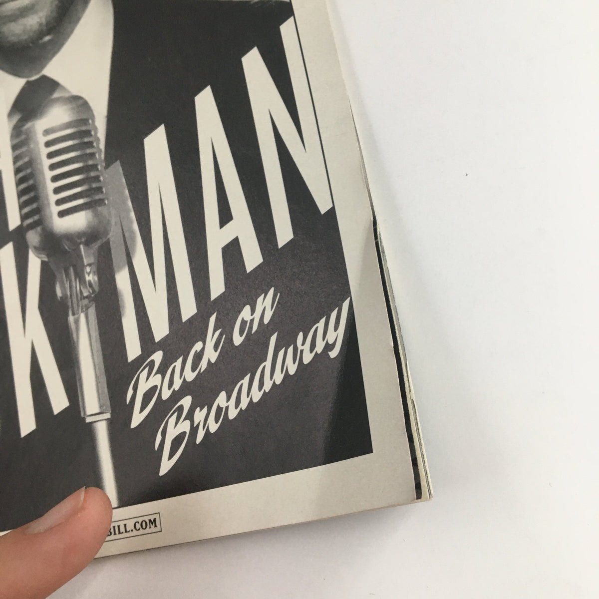Cover of the 2011 Playbill featuring Hugh Jackman in 'Back On Broadway' with a vintage microphone.
