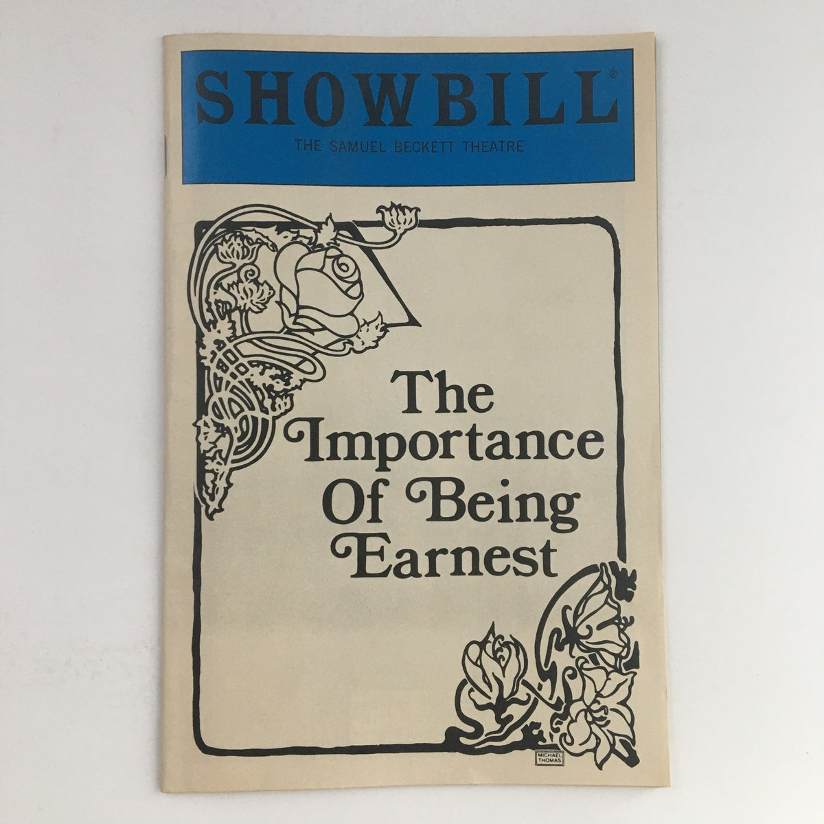 1985 Playbill titled 'The Importance Of Being Earnest' from The Samuel Beckett Theatre, featuring a vintage design with floral motifs.