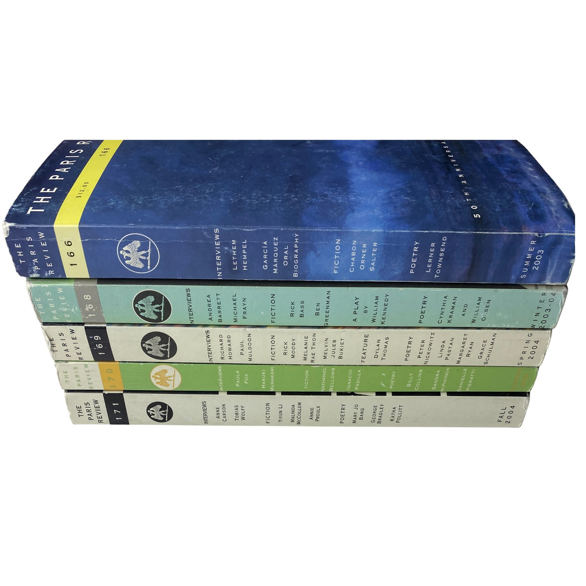 Spine view of Lot of 5 The Paris Review Magazine 2003 - 2004 Winter, Spring, Summer & Fall highlighting magazine titles and seasons.