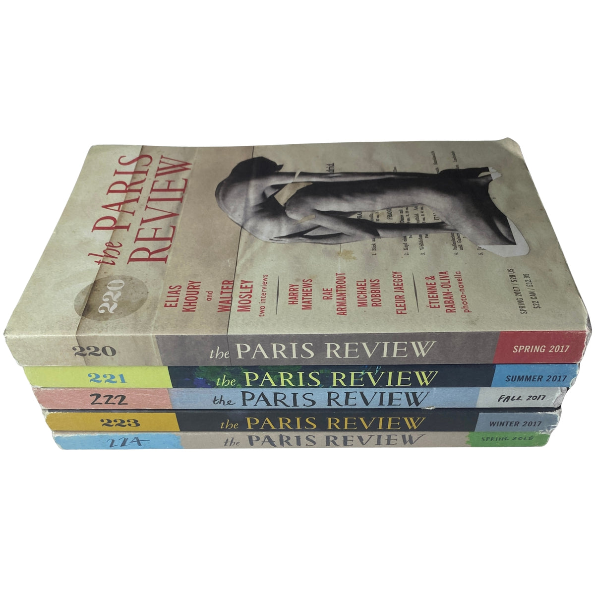 Lot of 5 The Paris Review Magazine 2017-2018 featuring issues 220 to 224, including Spring 2017, Summer 2017, Fall 2017, Winter 2017, and Spring 2018, stacked together, showcasing very good condition and well-preserved literature.