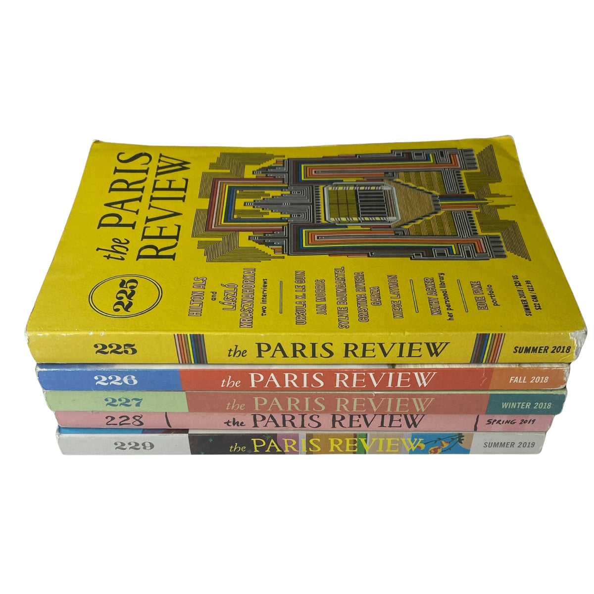 Stack of The Paris Review Magazine issues 225 to 229 from 2018-2019 showcasing the distinctive covers with titles and publication dates.