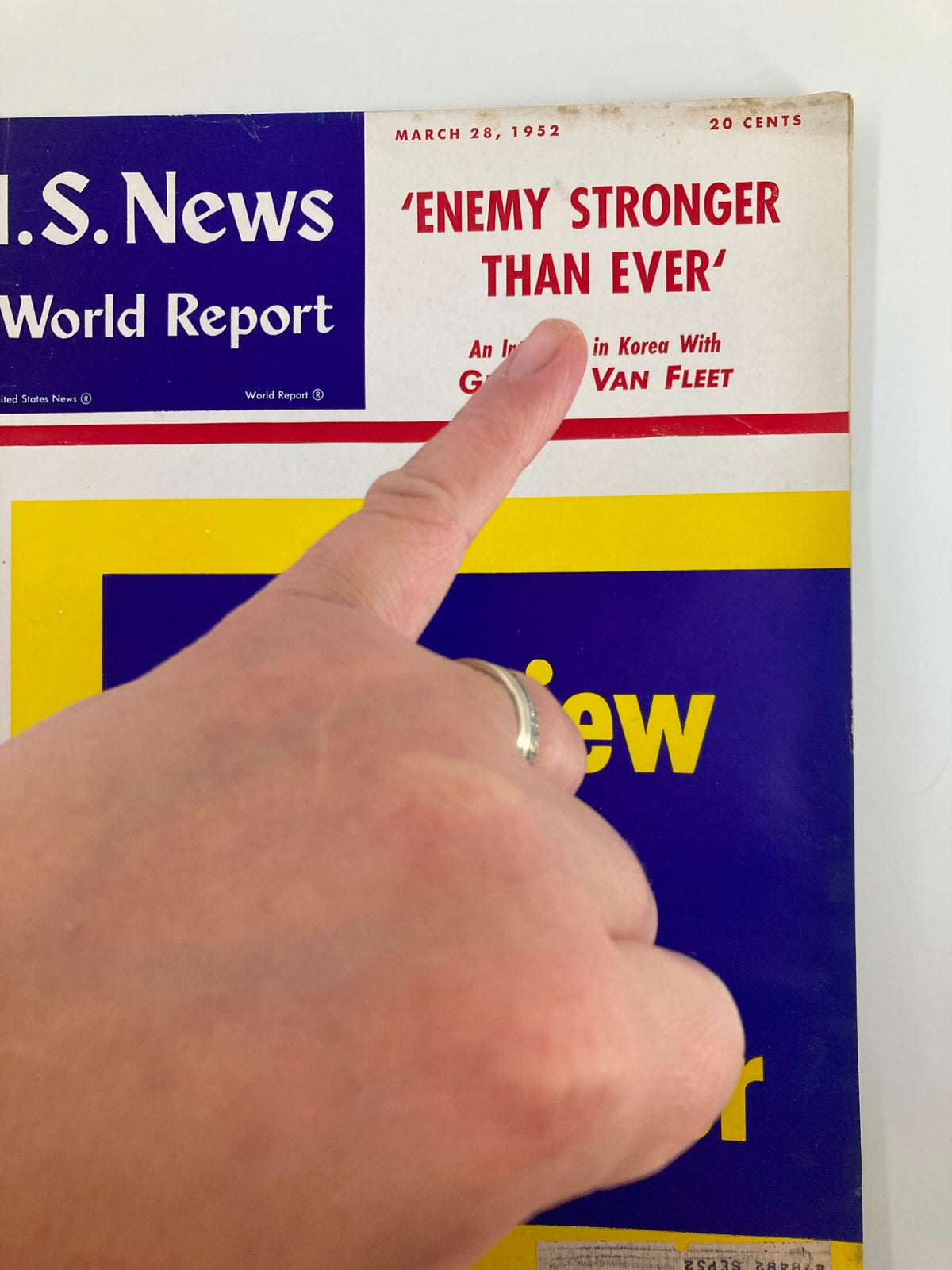 Cover of US News & World Report Magazine, March 28, 1952, featuring the headline 'Enemy Stronger Than Ever', showcasing a hand pointing at the title with a vintage design that highlights the historical significance of the Dwight Eisenhower interview inside.