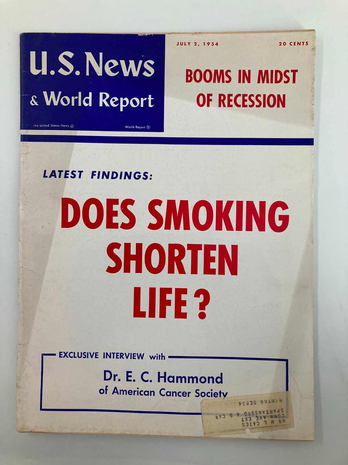 Cover of the US News & World Report Magazine from July 2, 1954, featuring the headline 'Does Smoking Shorten Life?' with a vibrant design, reflecting the mid-20th century vintage style and health discussions of the era.