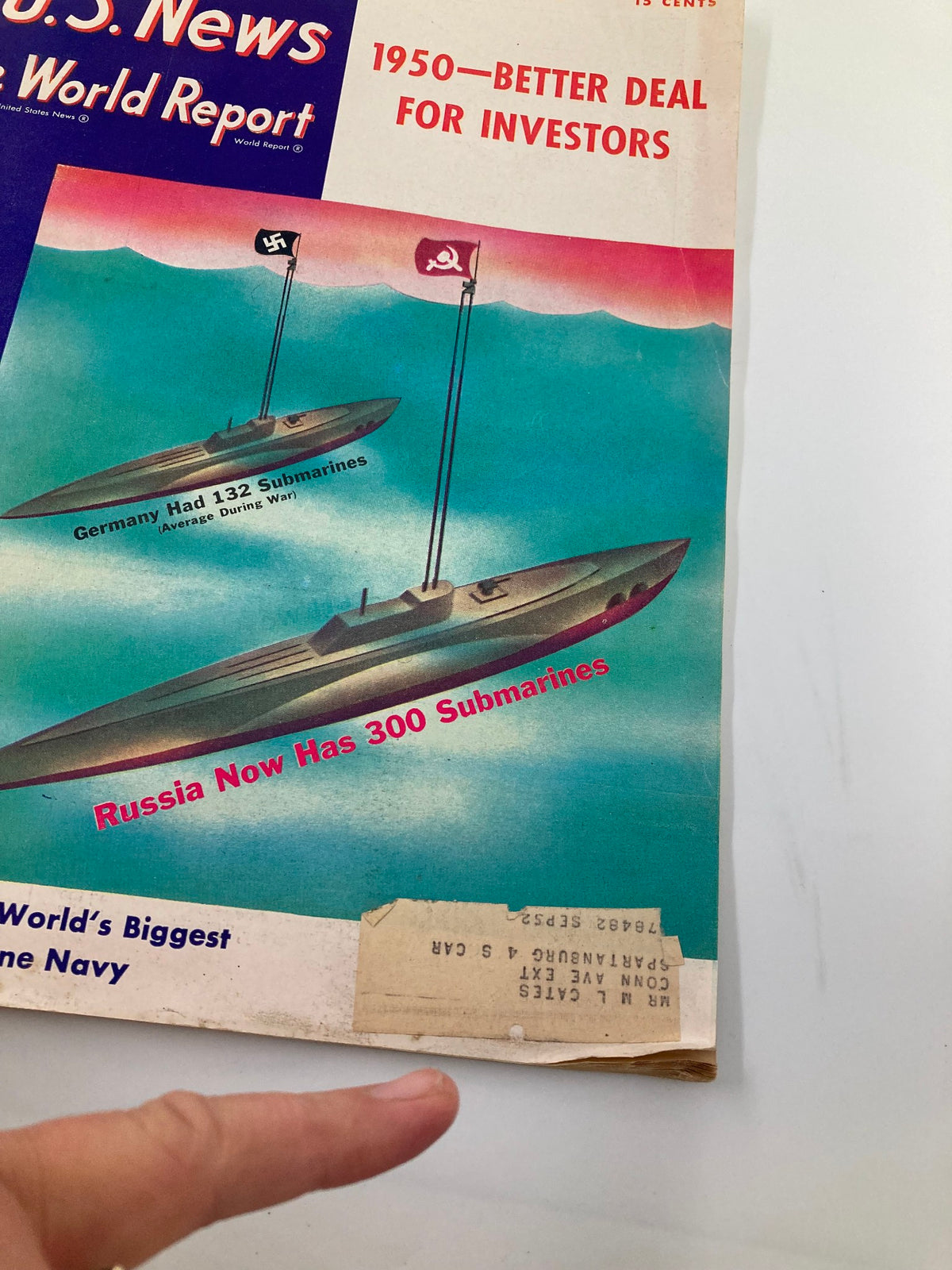 Close-up view of the US News & World Report Magazine December 23 1949 cover, highlighting details about submarine statistics and the magazine's title.