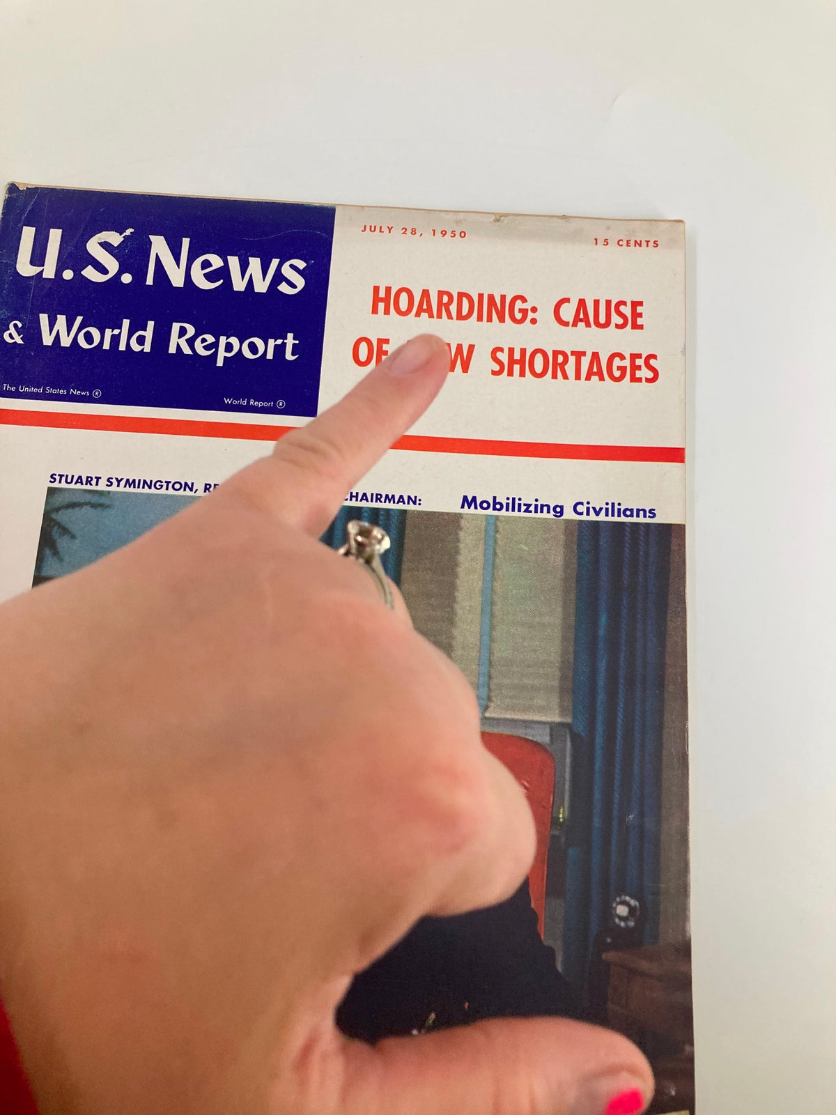 Close-up view of the US News & World Report Magazine cover from July 28, 1950, highlighting the theme 'Hoarding: Cause of New Shortages'.