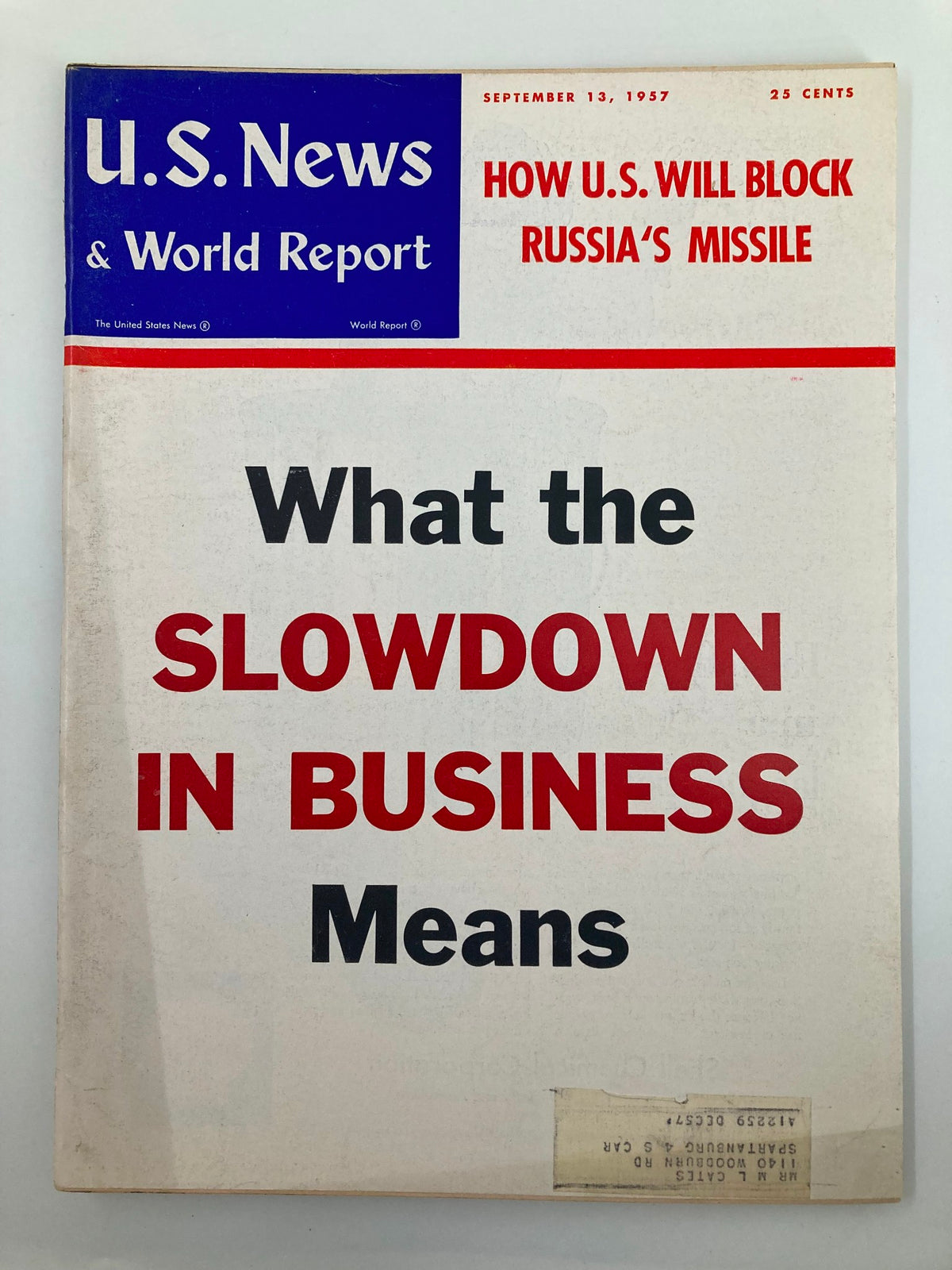 Cover of US News & World Report Magazine September 13, 1957 featuring the headline 'What the Slowdown in Business Means' and a subtitle about blocking Russia's missile.