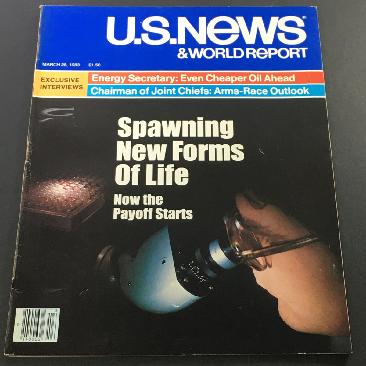 Cover of the vintage magazine U.S. News & World Report dated March 28, 1983, featuring the title 'Energy Secretary: Even Cheaper Oil Ahead' and 'Chairman of Joint Chiefs: Arms-Race Outlook' with an image of a person using a microscope.