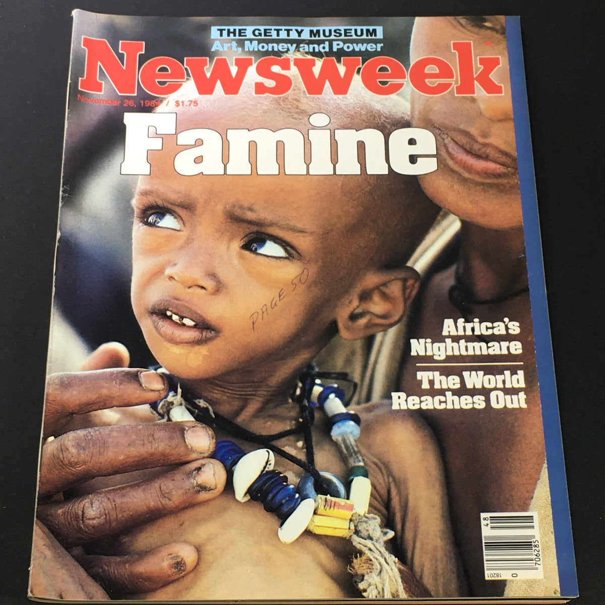 Cover of VTG Newsweek Magazine from November 26, 1984, titled 'Africa Nightmare / World Reaches Out,' depicting a child affected by famine, highlighting the socio-political issues in Africa during the 1980s.