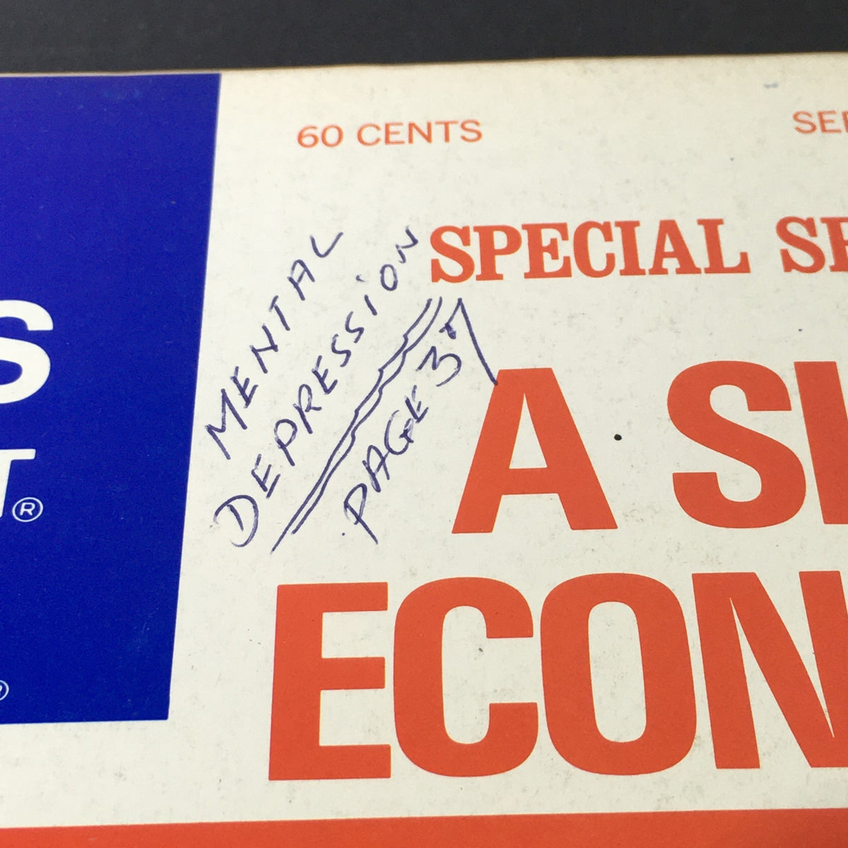 Close-up of the vintage US News & World Report cover from September 9, 1974, showing handwritten notes beside the title 'A Sick Economy,' indicating topics discussed within the magazine related to mental depression.