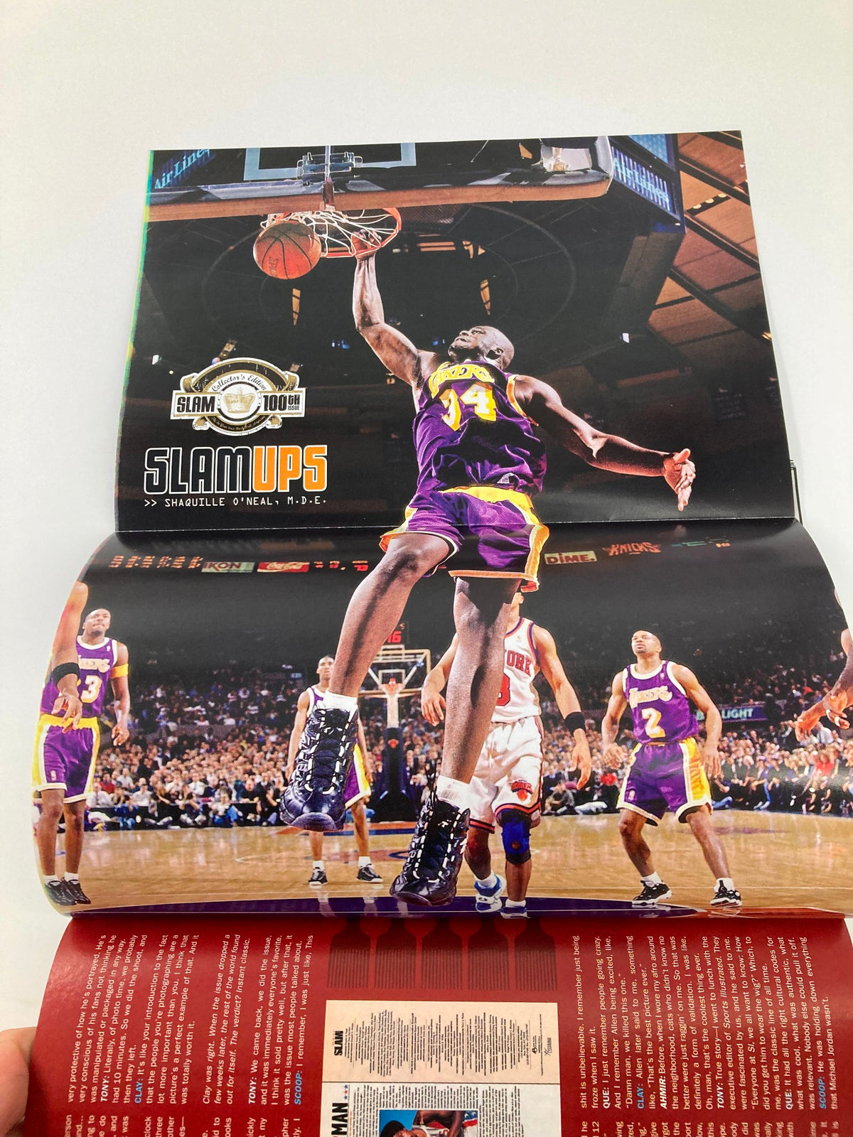 Fold-out page from Slam Magazine August 2006 #100 displaying a slam dunk by a basketball player, celebrating basketball action.