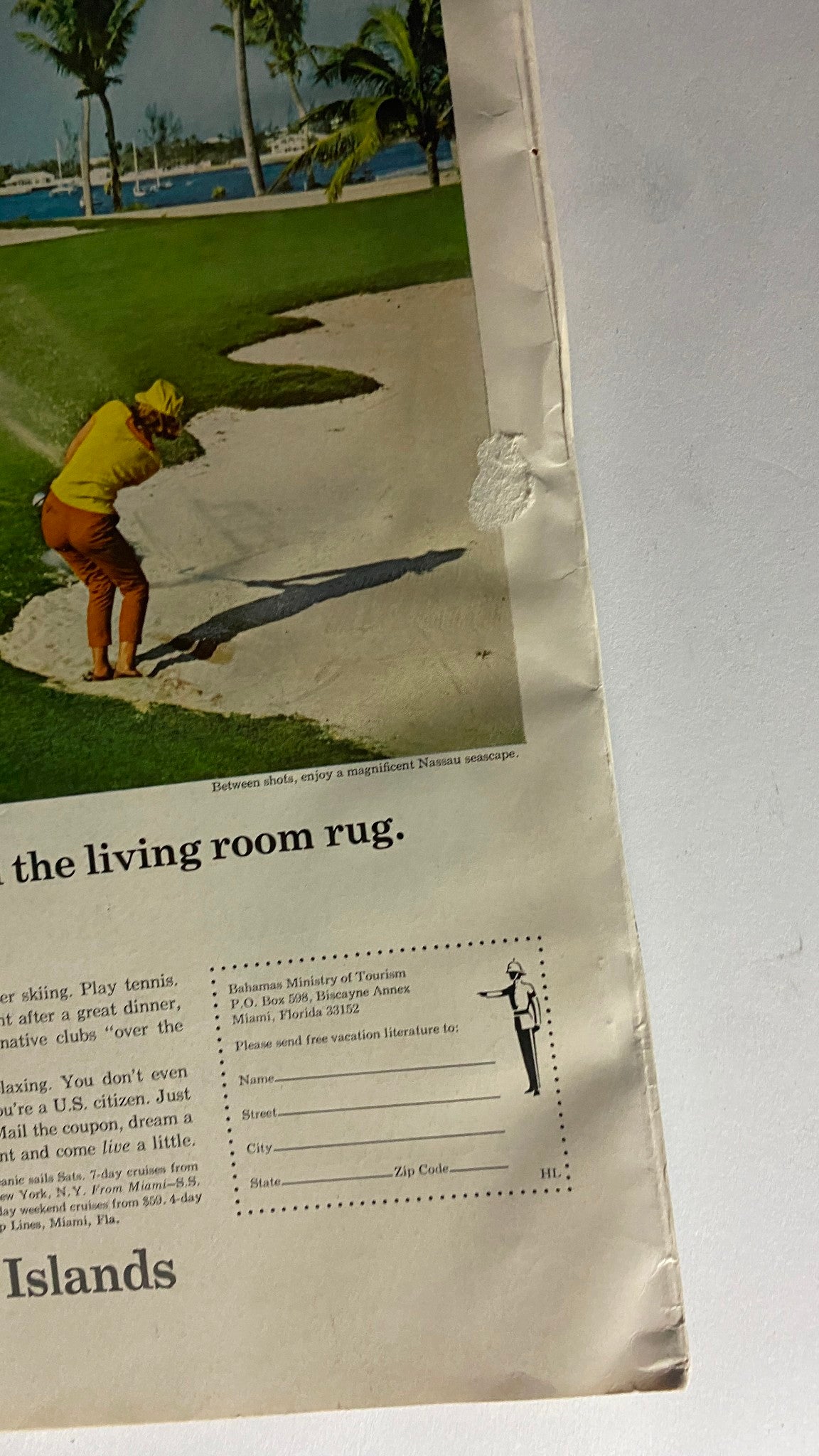 Close-up of golf advertisement in the March 1967 VTG Holiday Magazine, featuring a golfer in a tropical setting.
