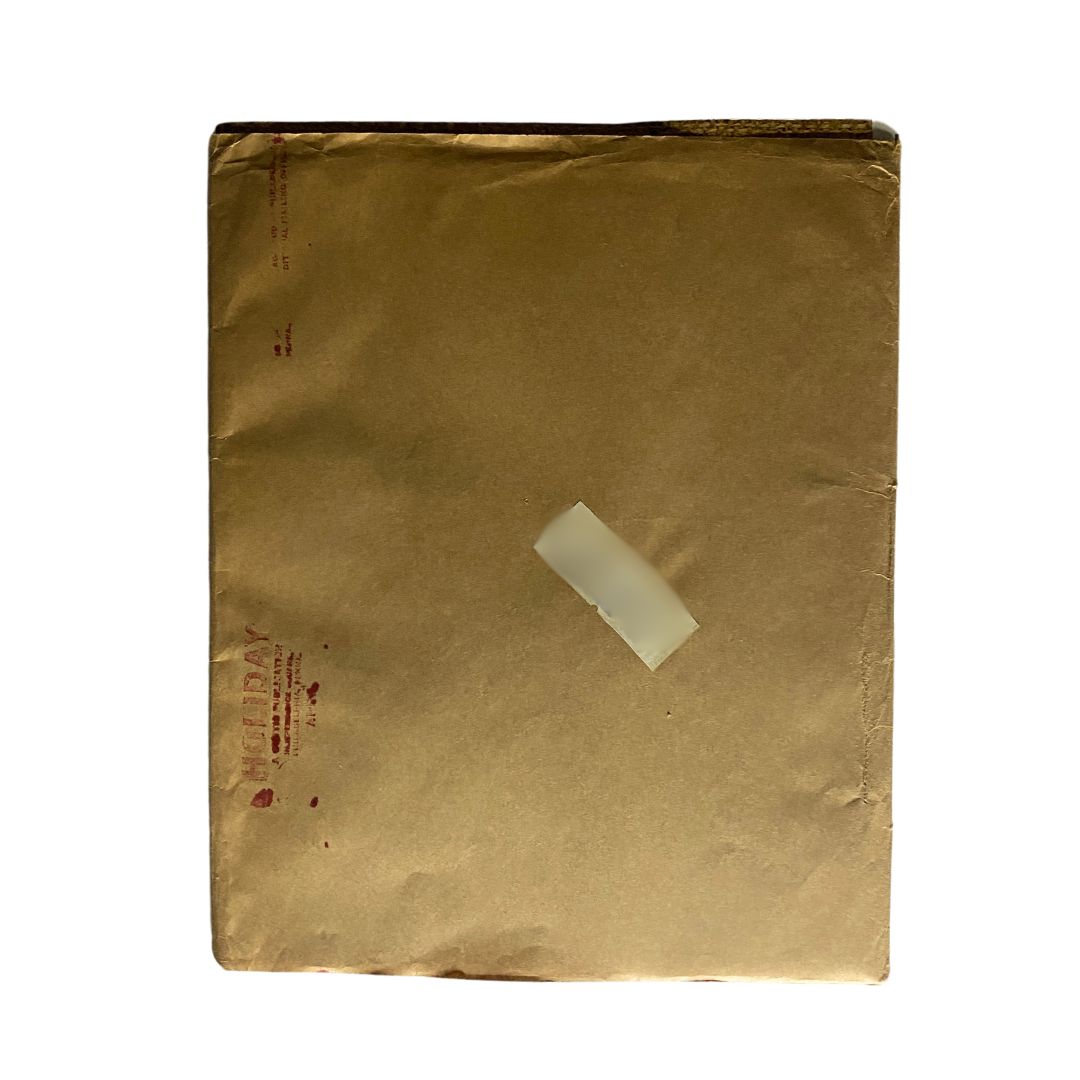 VTG Holiday Magazine April 1967 Volume 41 No. 4, featuring a protective packaging envelope showing signs of age, ideal for collectors of vintage literary publications.