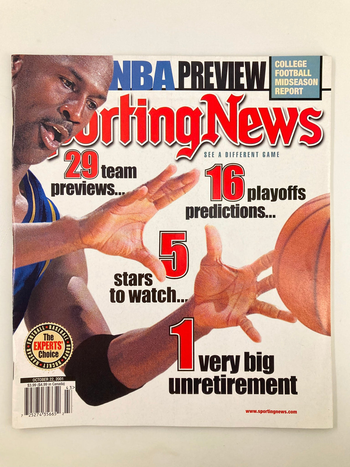 The Sporting News Magazine cover from October 22, 2001, featuring Michael Jordan during his time with the Wizards, highlighting NBA previews, team predictions, and notable players to watch.