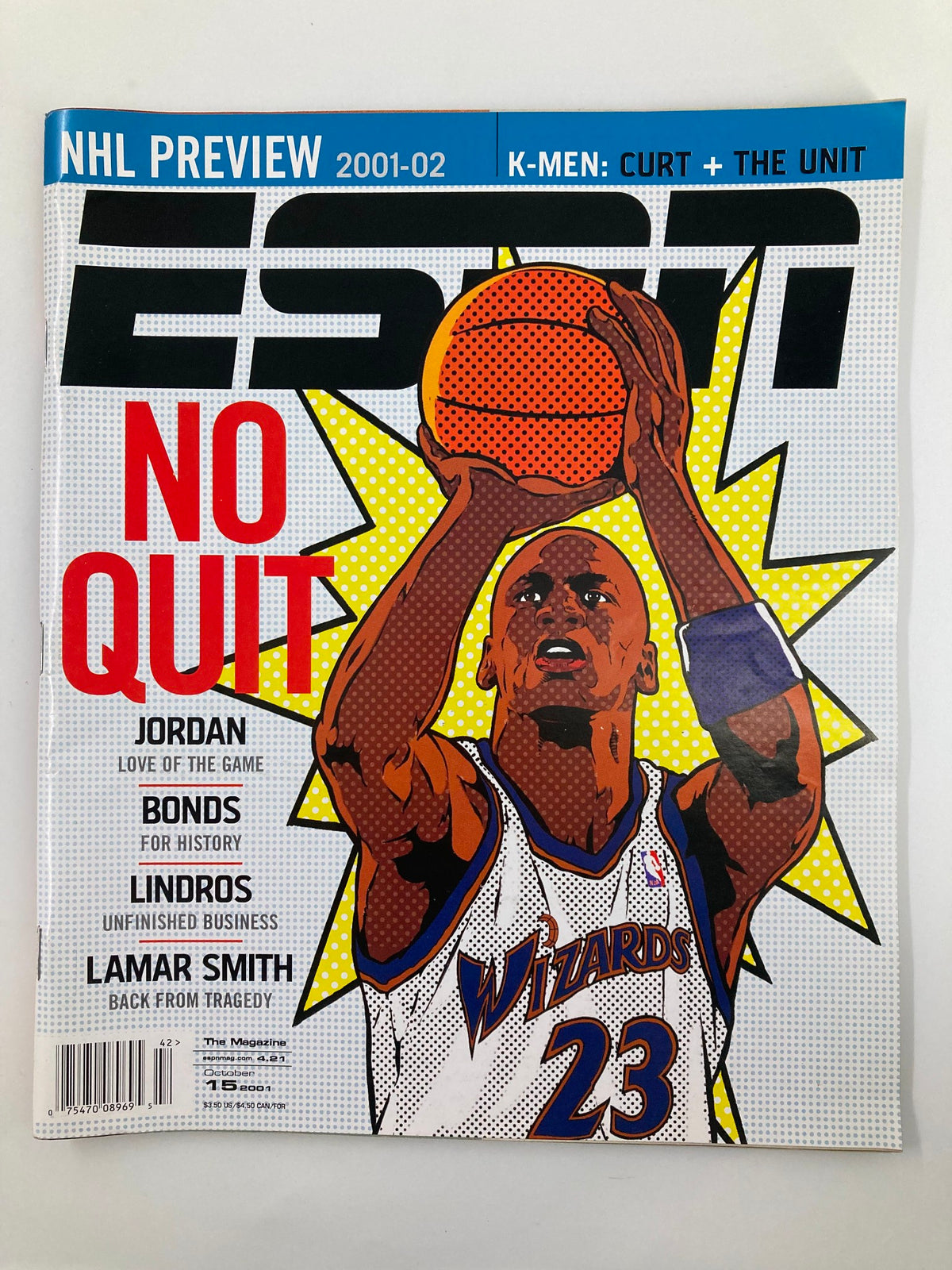 Cover of ESPN The Magazine October 15, 2001 featuring Michael Jordan in a dynamic pose, showcasing his determination with the text 'NO QUIT' highlighting his legacy as a sports icon.