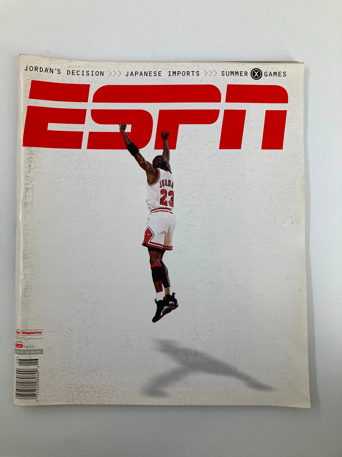 Cover of ESPN The Magazine dated June 29, 1998 featuring Michael Jordan in action, showcasing his iconic leap and jersey number 23, along with text on Japanese imports and summer games.