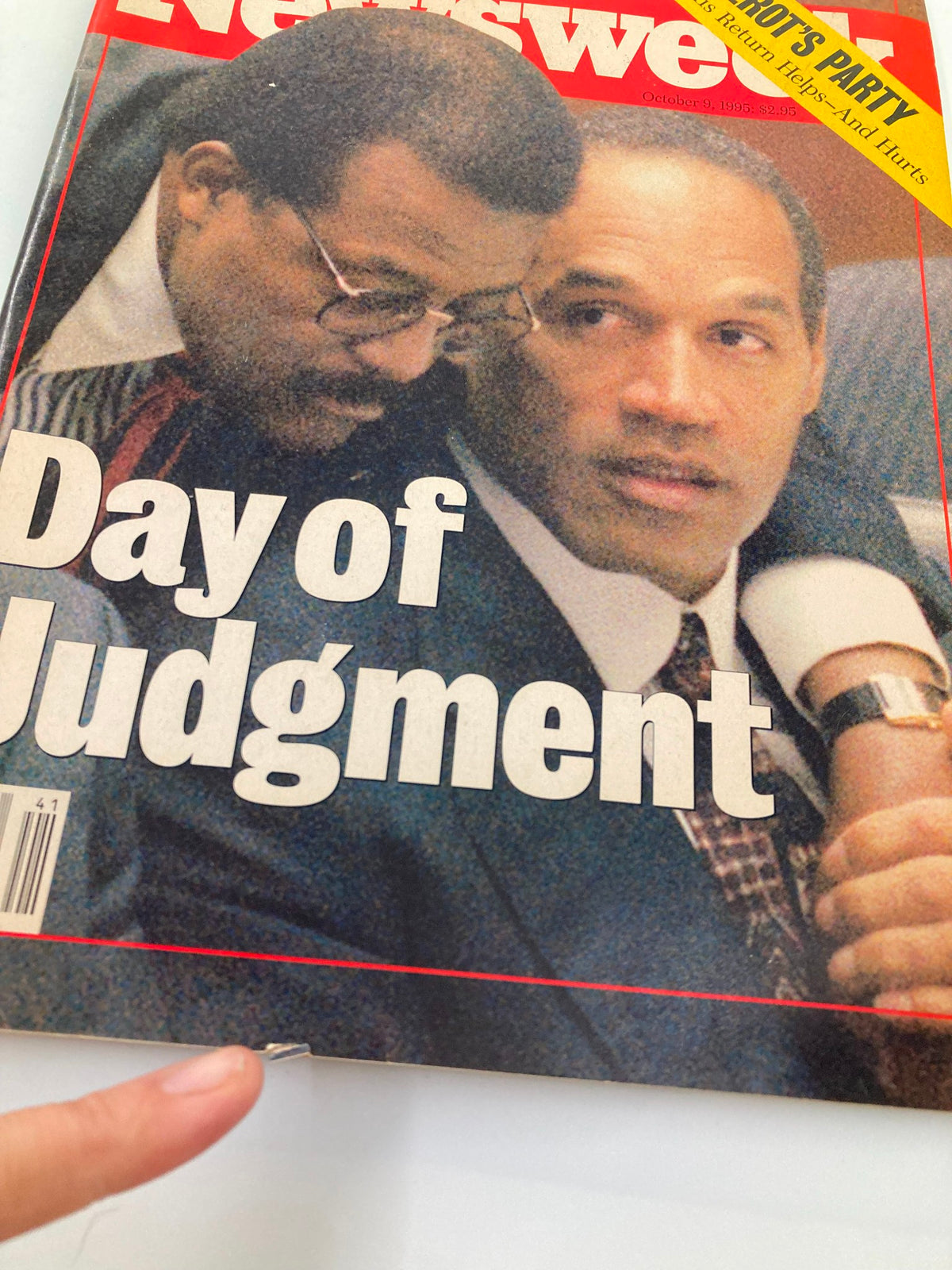 Close-up of the Newsweek Magazine cover from October 9, 1995, titled 'Day of Judgment', showing O.J. Simpson and related figures, with a visible crease near the bottom, emphasizing its vintage appeal.