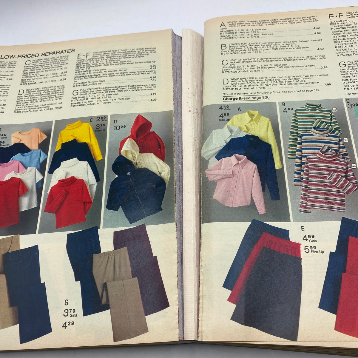 Inside page of the 1979 JCPenney Fall and Winter Softened Dressing Catalog displaying a variety of low-priced separates including tops and pants.