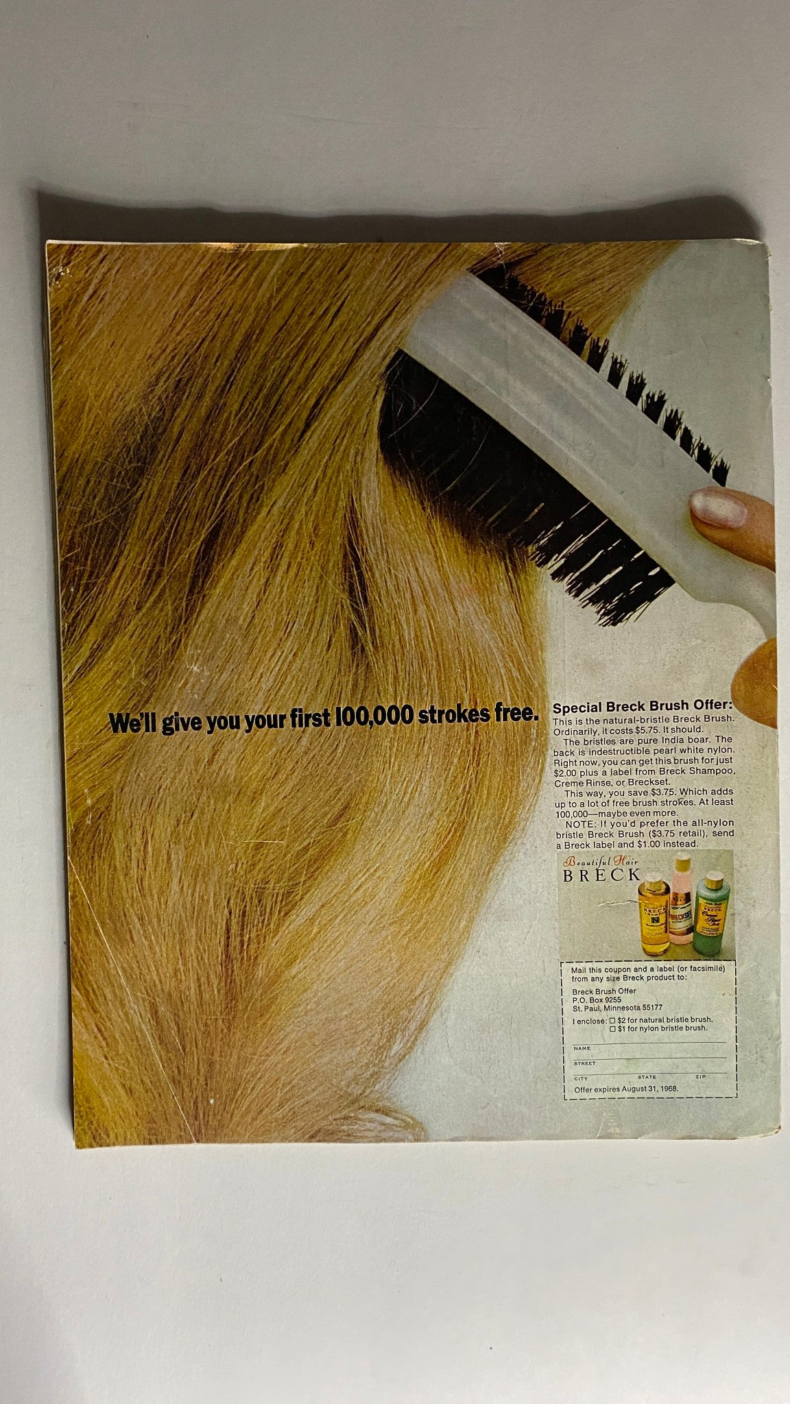 Back cover of VTG American Home Magazine May 1968, featuring a promotional advertisement for Breck hair products with an illustration of a woman brushing her hair.