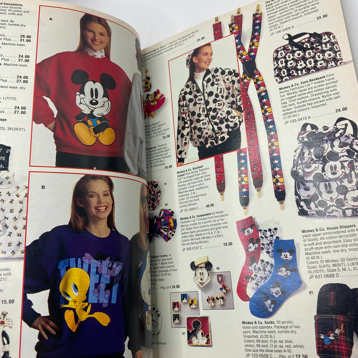 Page from the 1994 JCPenney Christmas Gifts Under $30 Catalog showcasing colorful Disney-themed sweatshirts and accessories on models, capturing the nostalgic fashion of the early 90s.