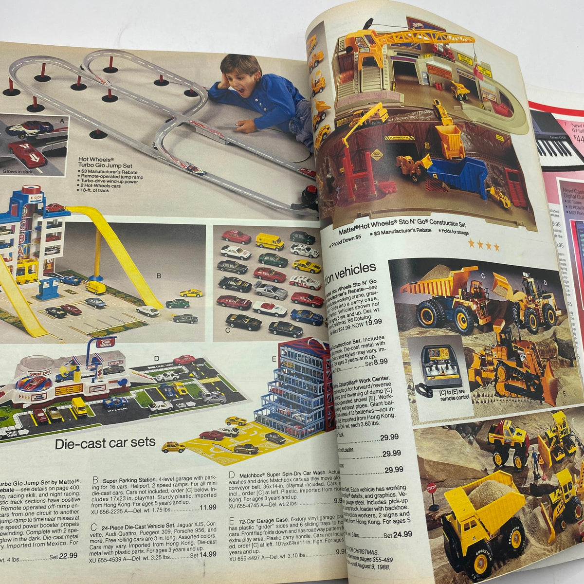 Interior page of the 1987 JCPenney Christmas Sophisticated Shimmer Catalog displaying die-cast car sets and track layouts along with various toy cars and construction vehicles.