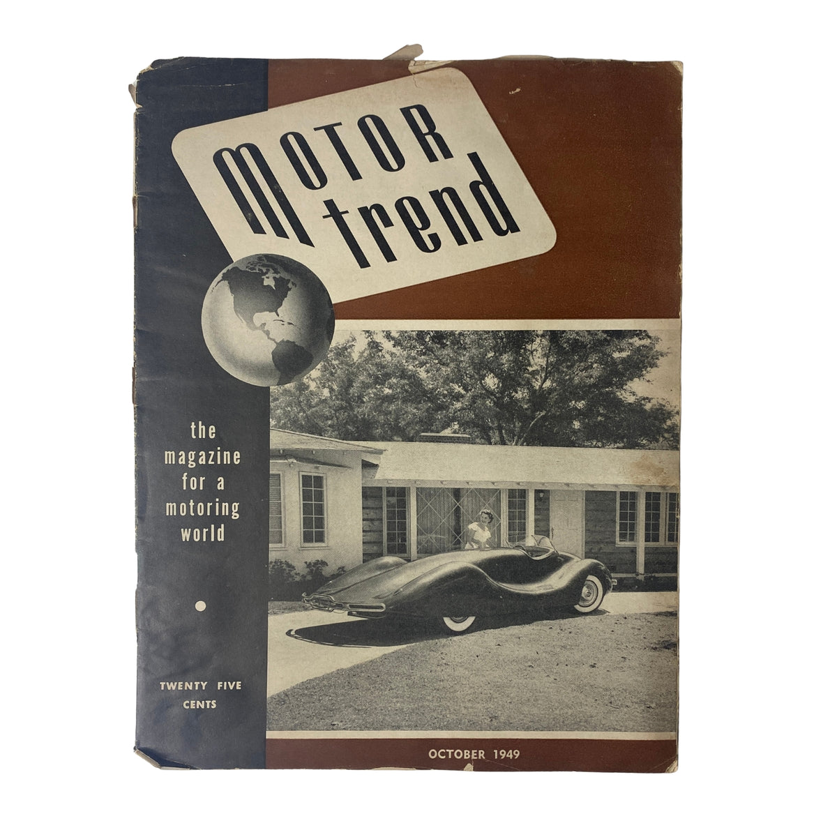 Cover of Motor Trend Magazine, October 1949, featuring Ethel Williams in a Rita LaRoy model with a vintage car and a house in the background. This issue highlights automotive innovations and trends from the late 1940s.