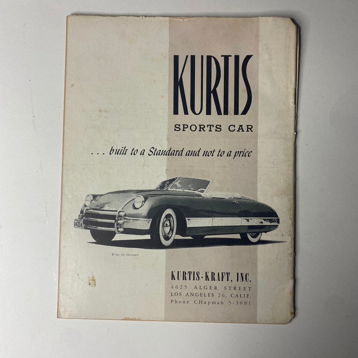 Cover of Motor Trend Magazine November 1949 featuring Herb Bryers' artwork. The magazine highlights early automotive culture with key articles on Pikes Peak and Watkins Glen Grand Prix.
