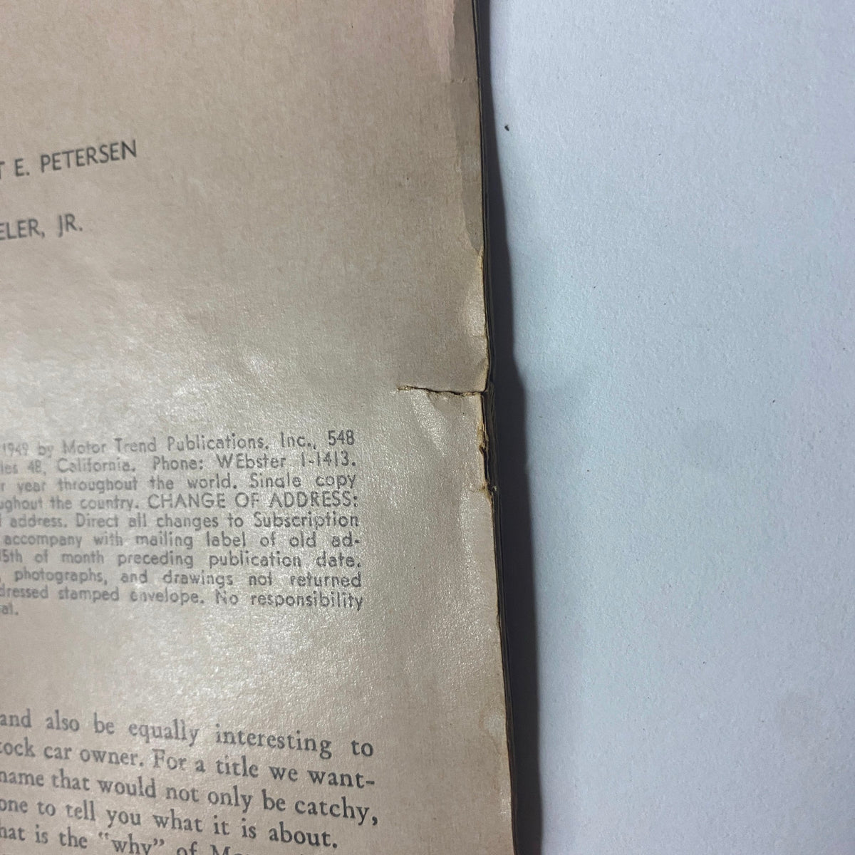 Inside back cover of Motor Trend Magazine September 1949, showing details and publication information alongside creases, part of the collectible Kurtis Sport Car issue.