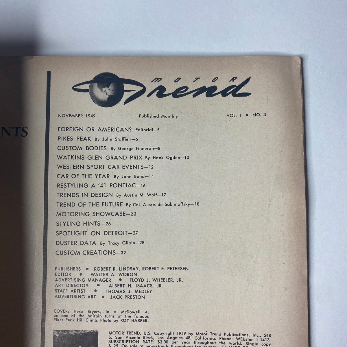 Interior page from Motor Trend Magazine November 1949 listing contents including articles on Pikes Peak, Car of the Year, and Custom Bodies.