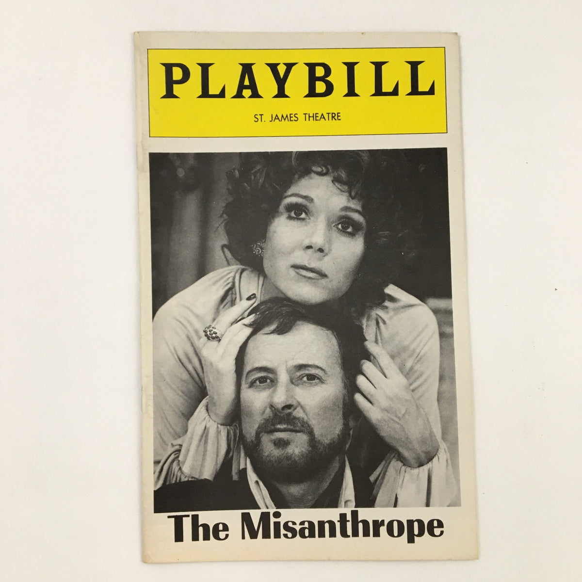 Front cover of the 1975 Playbill for The Misanthrope at St. James Theatre featuring artistic designs and actors.