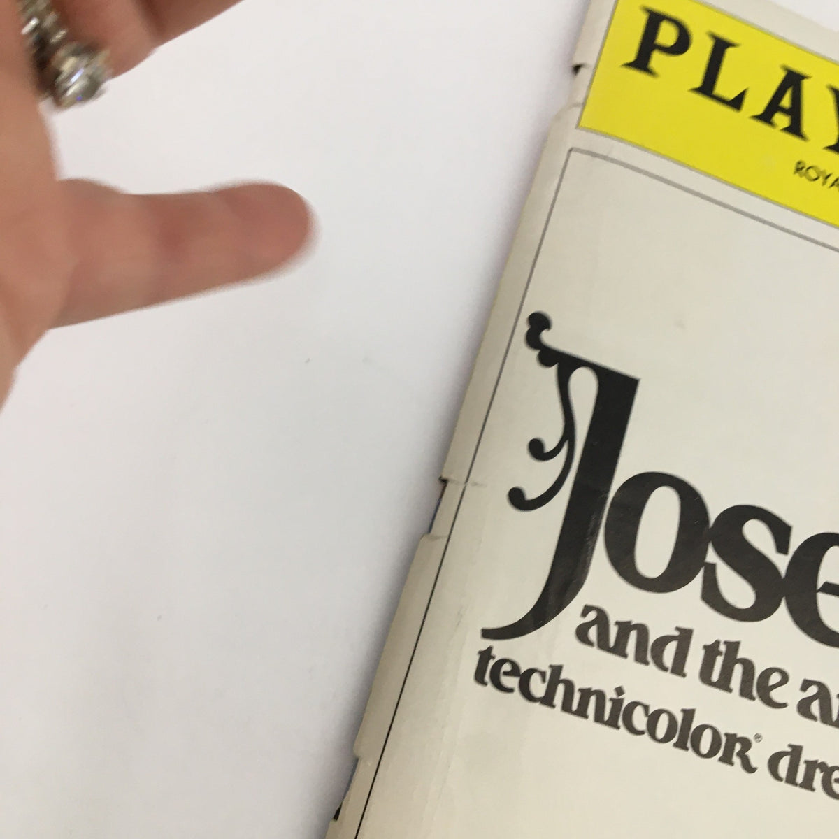 Cover of the 1983 Playbill for Joseph and the Amazing Technicolor Dreamcoat at the Royale Theatre, showcasing vibrant title graphics.