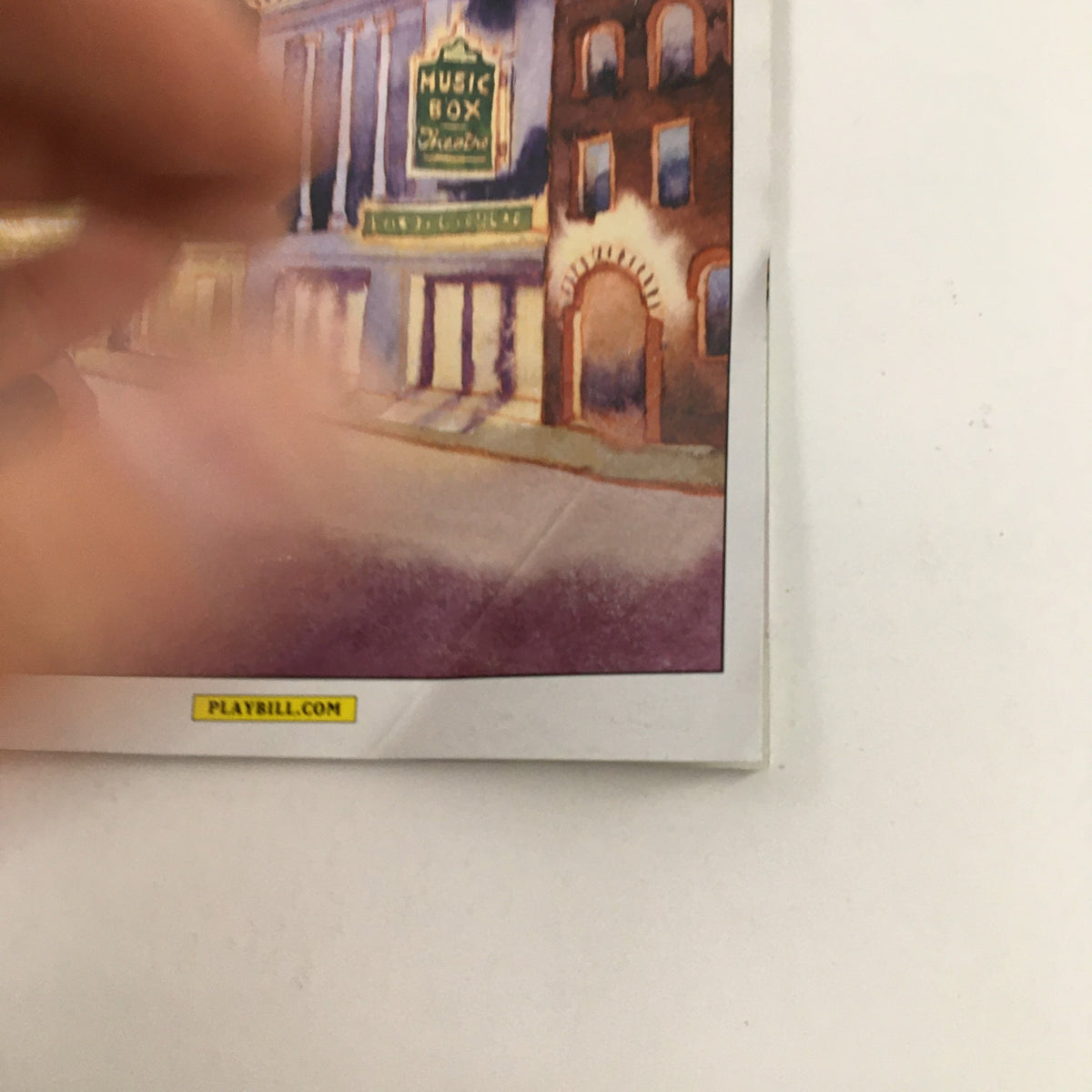 Close-up of the 2014 Playbill for Act One, highlighting the detailed artwork on the cover.