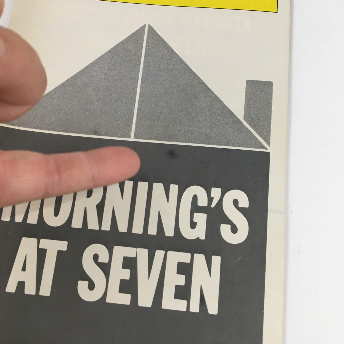 Close-up of the 1980 Playbill Lyceum Theatre for Morning's at Seven, showing minor imperfections and marks on the cover.