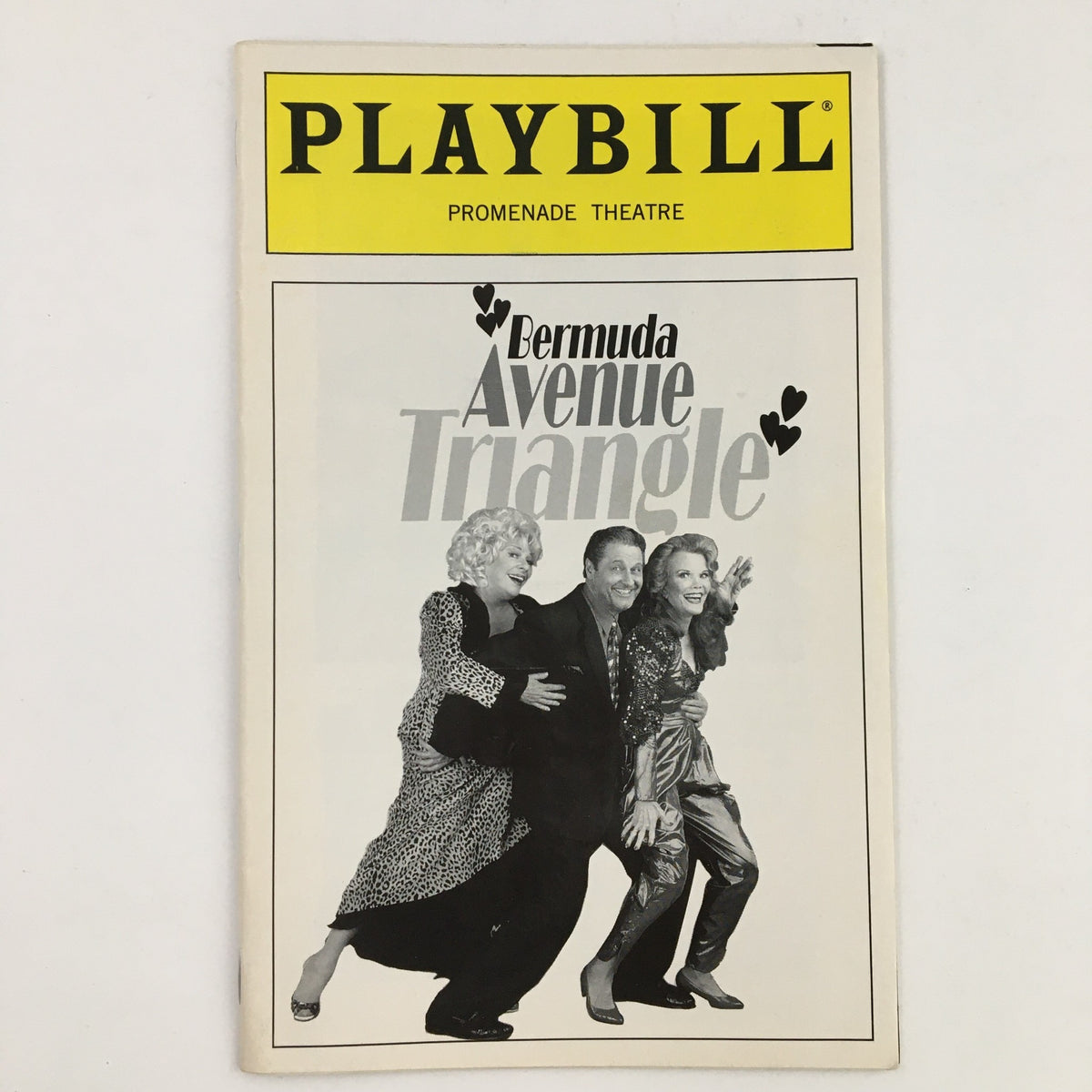 1997 Playbill for The Promenade Theatre production of Bermuda Avenue Triangle featuring actors on the cover.