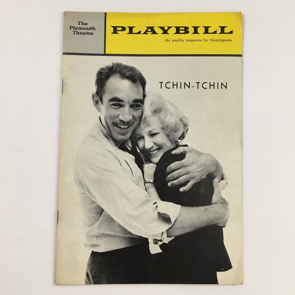 1963 Playbill for Tchin-Tchin by Sidney Michaels featuring a nostalgic cover image of two actors embracing.