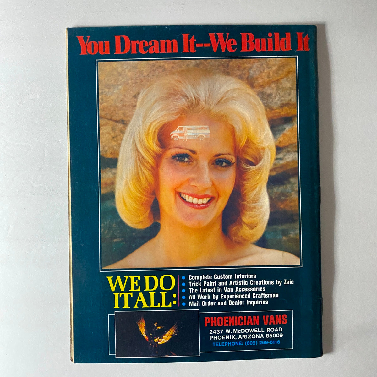 Promotional cover from VTG Truckin' Magazine January 1976 advertising custom van creation services with an attractive female model.