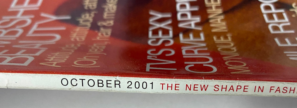 Spine detail of Mode Magazine, October 2001, showcasing the publication date and the tagline 'The New Shape in Fashion' highlighting its relevance in style.