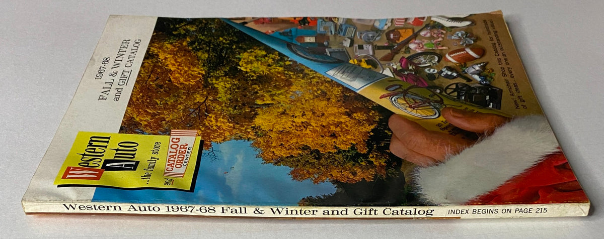Side view of the 1967-1968 Western Auto The Family Store Fall & Winter Catalog displaying the index section and a wintery autumn background.