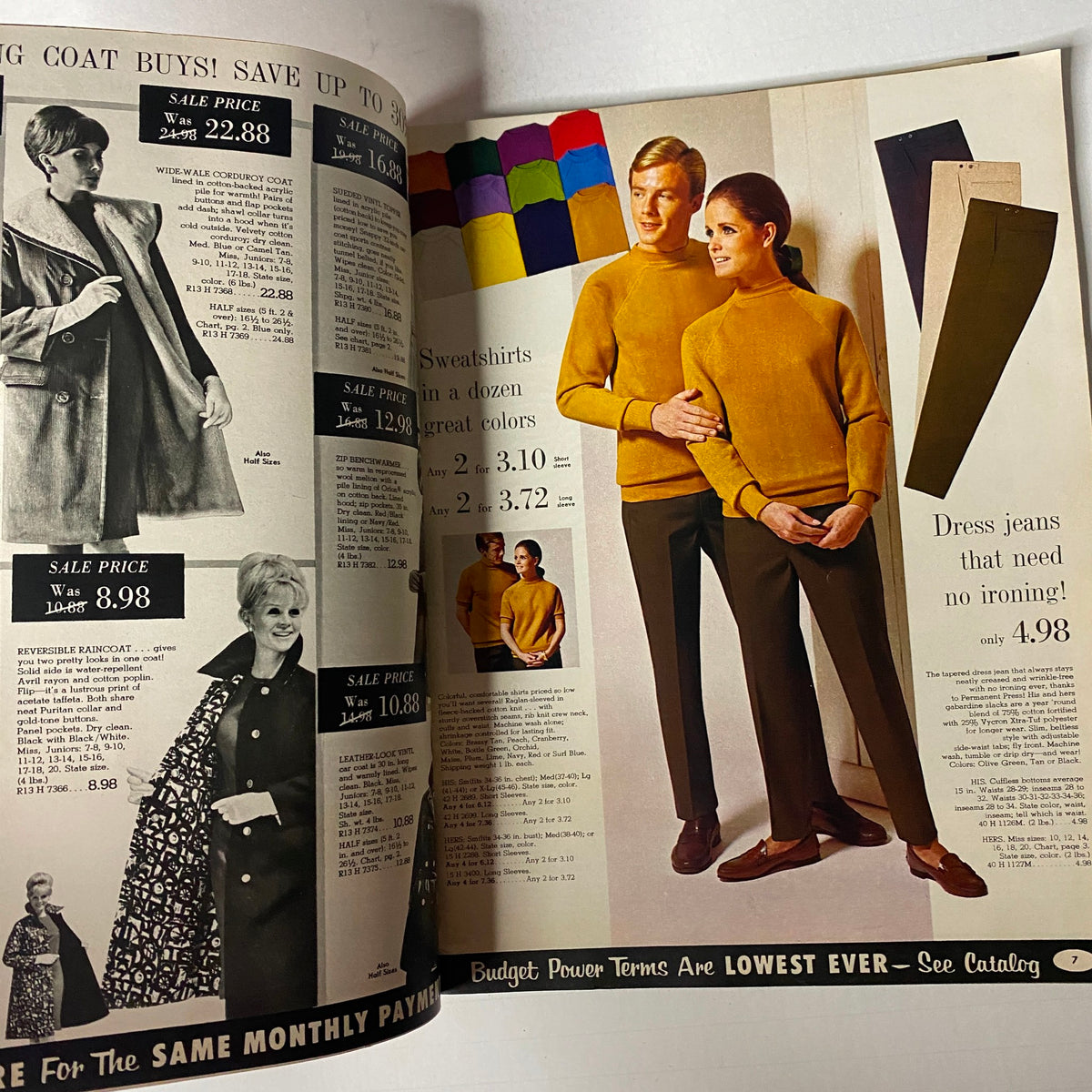 Inside spread of the 1967 Spiegel Price Leadership Sale Catalog showcasing stylish sweatshirts and dress jeans with prices and color options, emphasizing mid-century fashion.