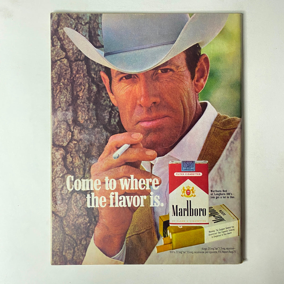 Vintage Marlboro advertisement featuring a cowboy, promoting the brand as 'Come to where the flavor is' in Car Craft Magazine April 1972 Vol 20 No. 4.