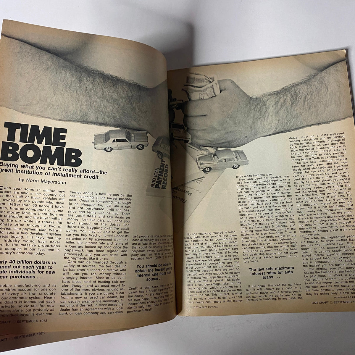 Article spread titled 'Time Bomb' from Car Craft Magazine September 1973 discussing the implications of installment credit and financing for car purchases.
