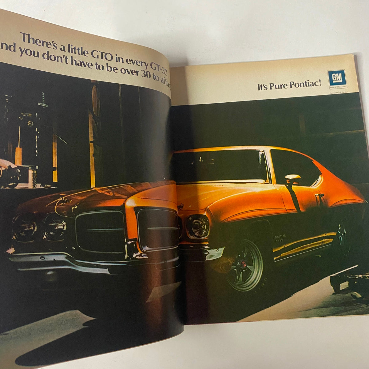 Advertisement in Car Craft Magazine February 1971 Vol 19 No. 2 showcasing a Pontiac GTO with the tagline 'It’s Pure Pontiac.'