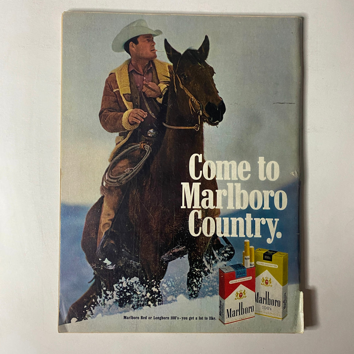 Vintage advertisement from Car Craft Magazine February 1971 Vol 19 No. 2 promoting Marlboro cigarettes with a cowboy image, titled 'Come to Marlboro Country'.