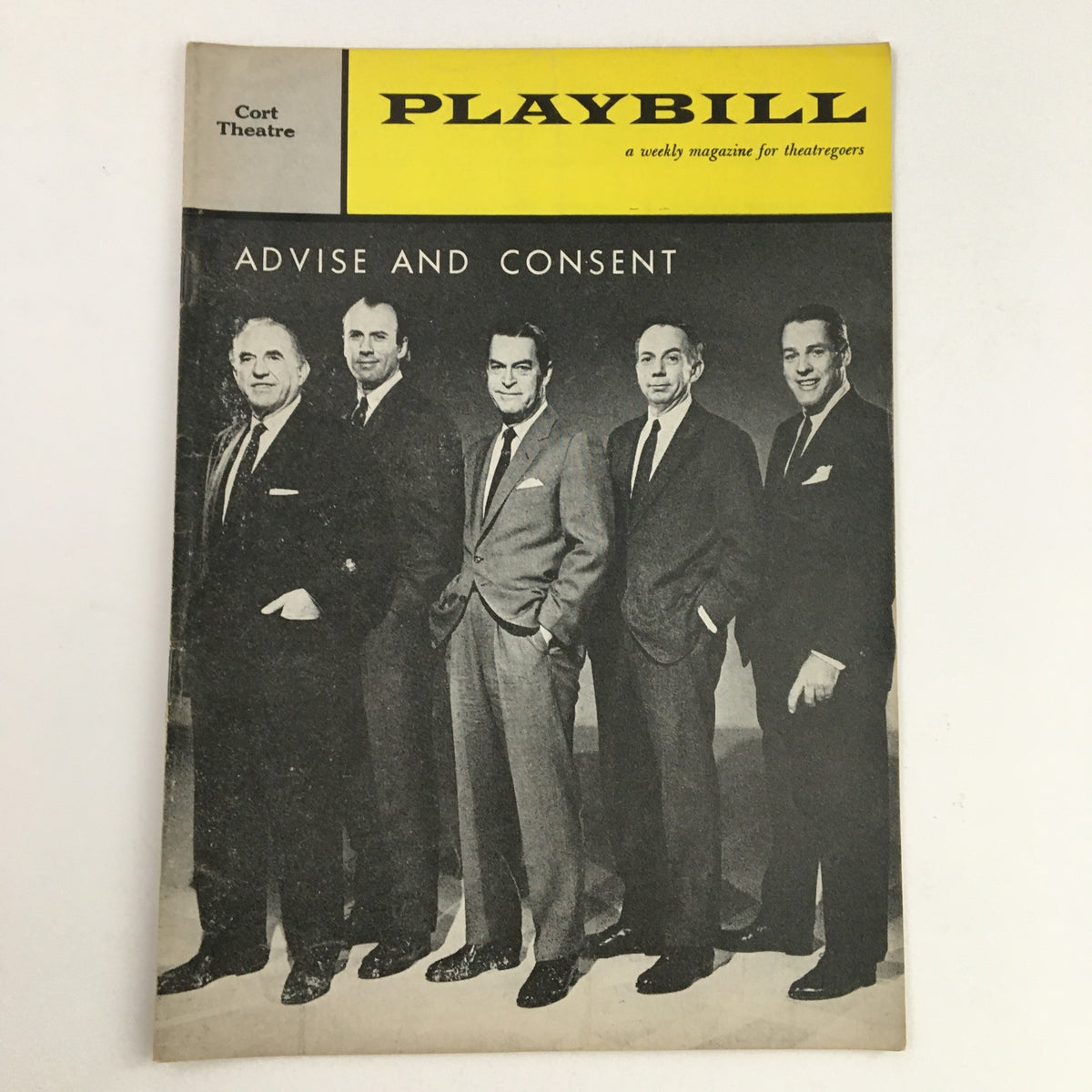1961 Playbill for Advise and Consent featuring the cast in formal attire at Cort Theatre.
