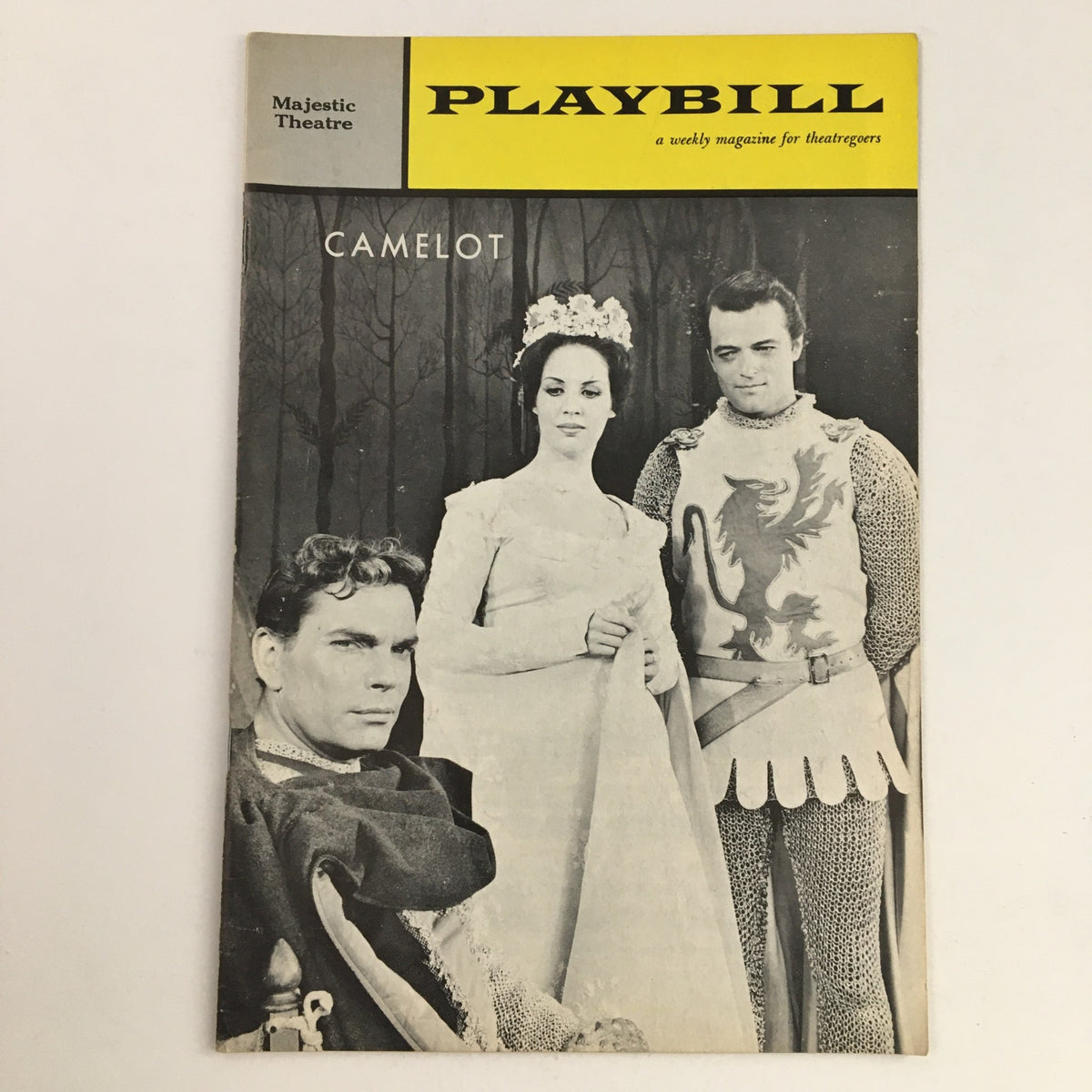 1962 Playbill for Camelot at Majestic Theatre featuring cast members William Squire and Janet Pavek, capturing the essence of a classic performance.
