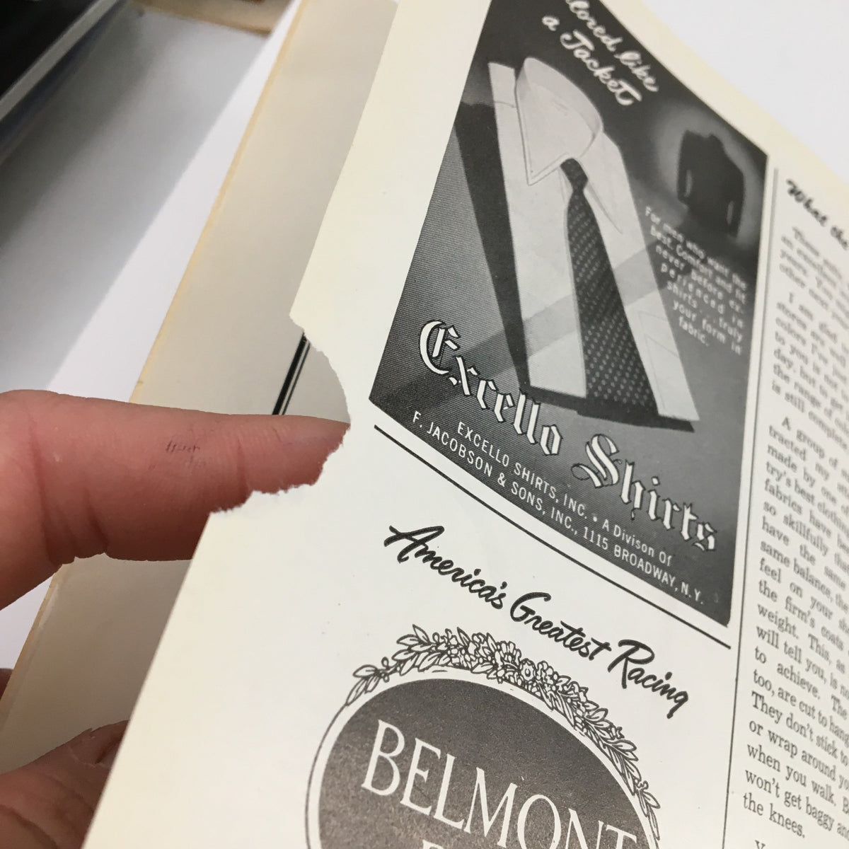 Torn section of the 1949 Playbill for The Madwoman of Chaillot showing an advertisement and wear on the page.