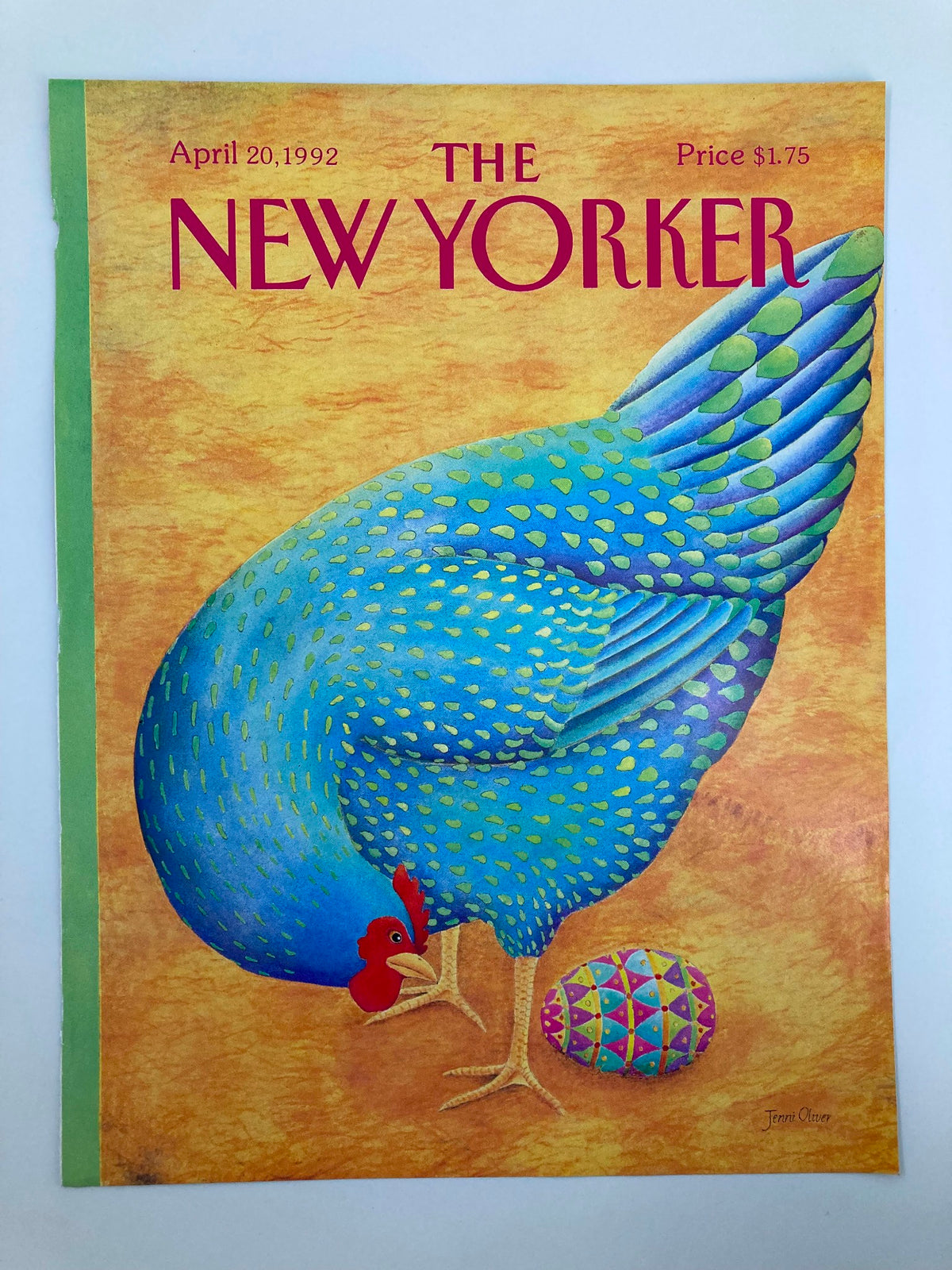 Cover only from The New Yorker, April 20, 1992, 'Chicken Lays Egg' by Jenni Oliver, showcasing a colorful blue chicken and an ornamental egg against a warm orange backdrop.