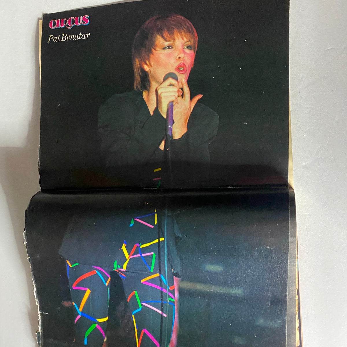 Pat Benatar performing live, showcasing her iconic style from the era, featured in the VTG Circus Magazine September 30 1981. A memorable moment in music history.