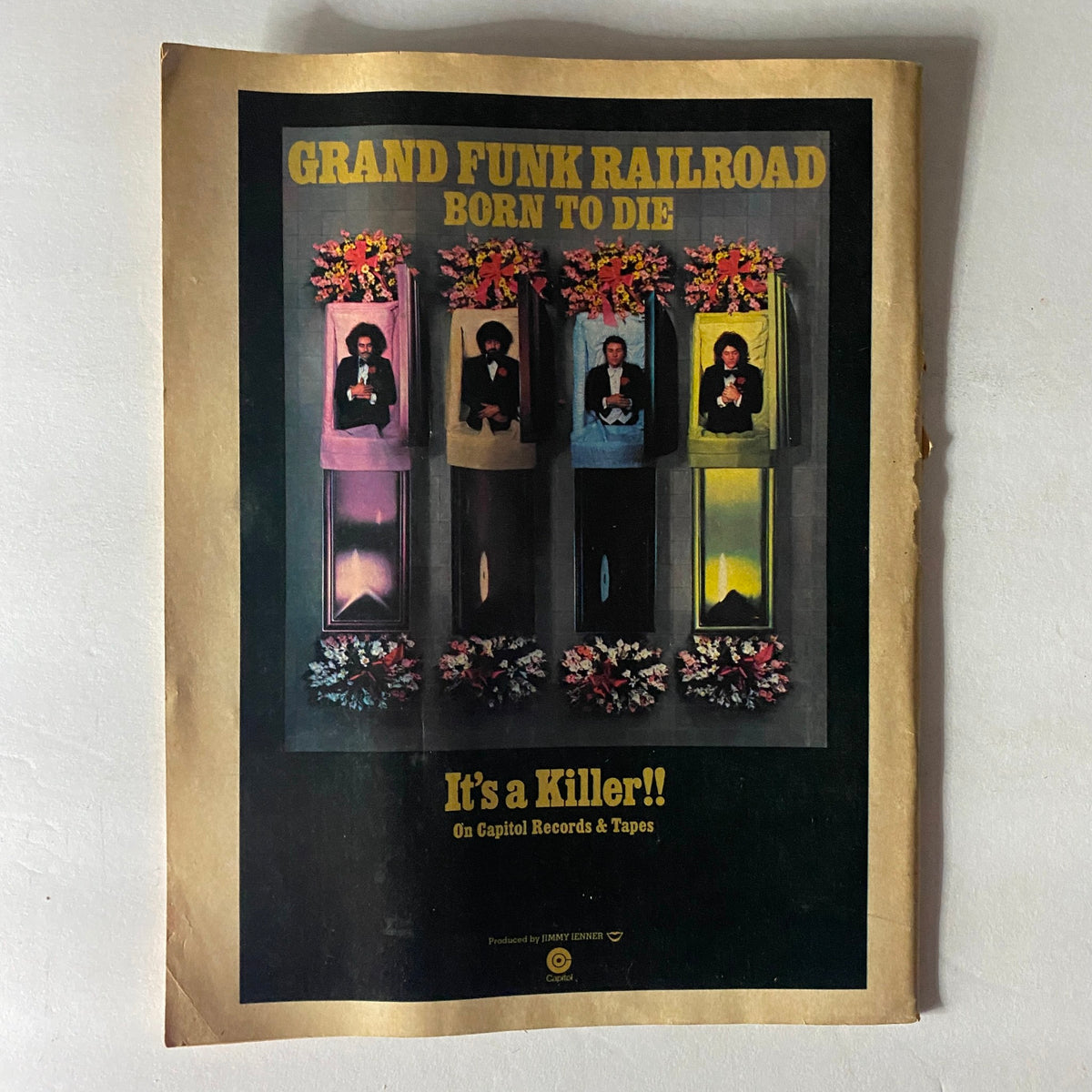 Ad page from VTG Circus Magazine March 2 1976, promoting the Grand Funk Railroad album 'Born to Die' with artistic visuals and a vintage style.